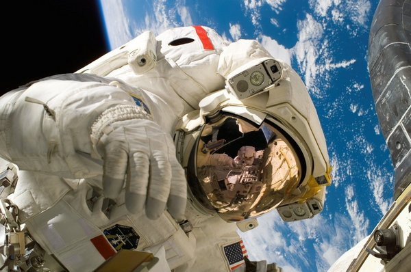Smart space suit with health monitoring and temperature control for astronauts