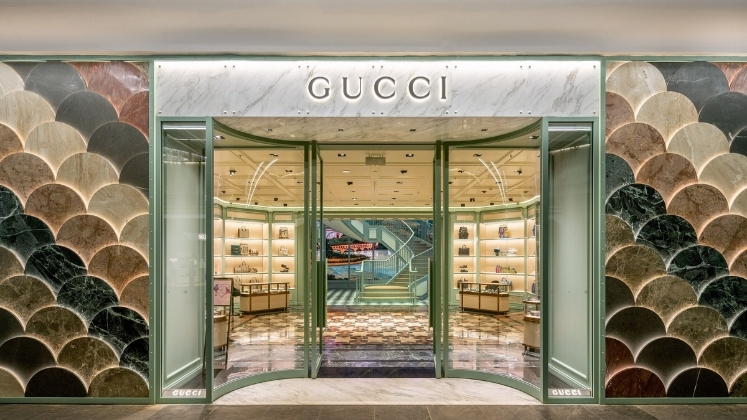 Luxury fashion store Gucci showcasing premium fabric designs in 2025