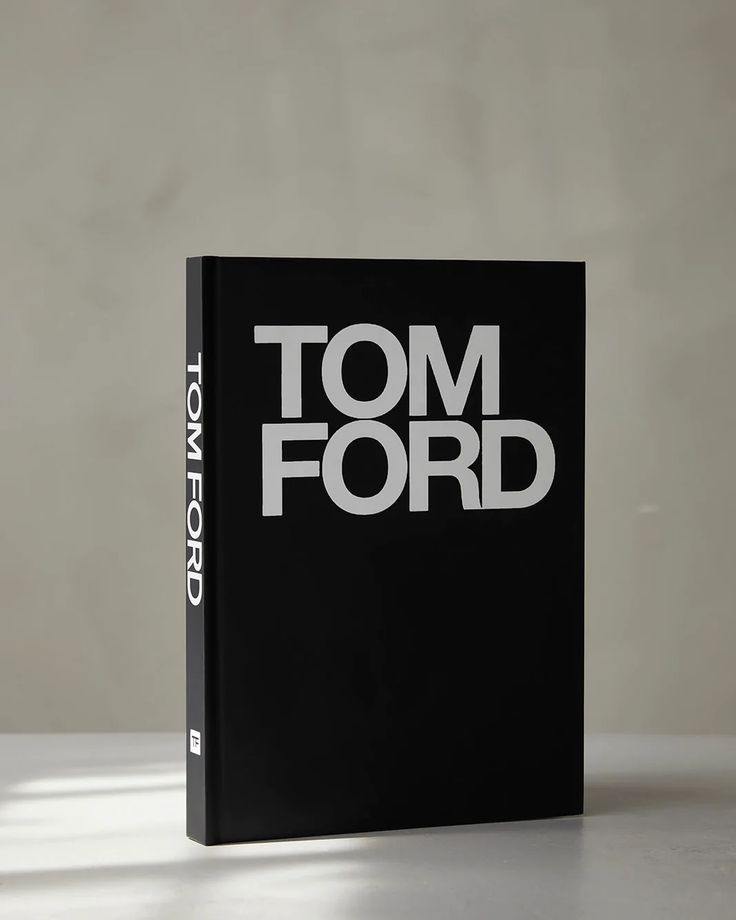 Tom Ford – Tom Ford hardcover book, sleek black cover with bold typography, luxury fashion designer monograph